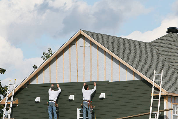 Professional Siding technician working in Wye Mills, MD